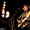 Buffy Sainte-Marie tour photos - Buffy smile guitar